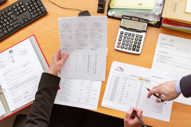 Person holding paper